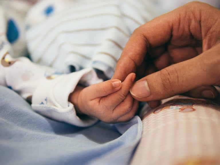 hand holding baby hand